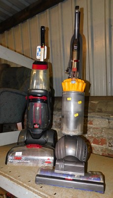 Lot 1112 - A silver upright carpet cleaner, together with...
