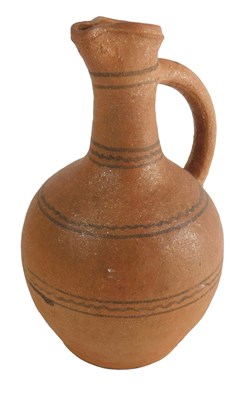 Lot 322 - A Medieval style jug, with plain and eight...