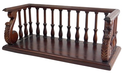 Lot 325 - A mahogany book rack in George IV style, with...