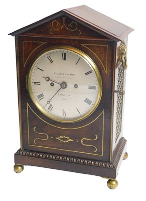 Lot 5 - A Regency rosewood and brass inlaid mantel...
