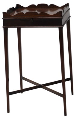 Lot 385 - A mahogany urn table in George III style, with...