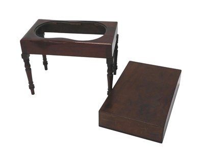 Lot 1152 - A George III mahogany bidet stand, with a...