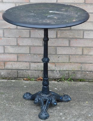 Lot 410 - A black painted garden table, with a circular...