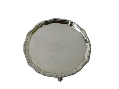 Lot 91 - A George III silver waiter, with a pie crust...