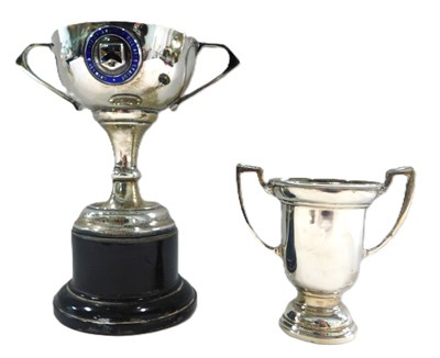 Lot 143 - A silver two-handled presentation cup, with...