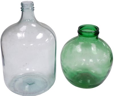 Lot 390 - A green glass carboy, 36cm high, and a glass...