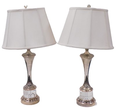 Lot 392 - A pair of contemporary white metal and glass...