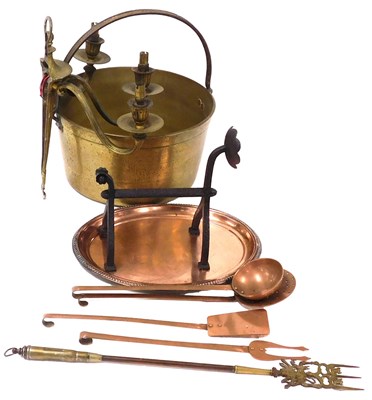Lot 409 - A brass jam pan, with a cast iron handle,...