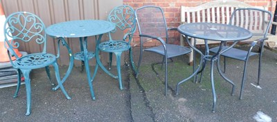 Lot 1137 - A green painted metal circular bistro table,...