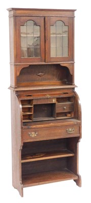 Lot 505 - A Victorian oak breakfront bookcase, the...
