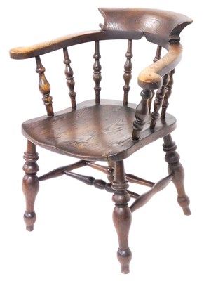Lot 520 - A Victorian oak and elm smoker's bow chair,...