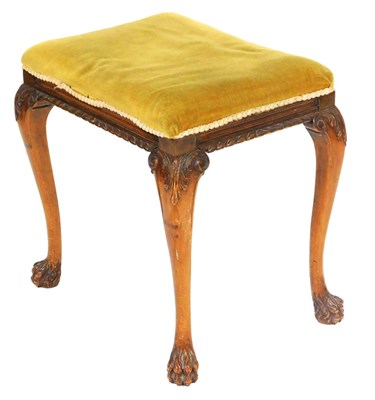 Lot 552 - A Georgian style mahogany stool, upholstered...