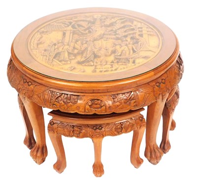 Lot 556 - A Chinese hardwood circular occasional table,...