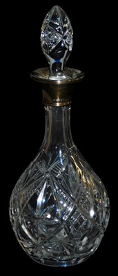 Lot 461 - A cut glass decanter and stopper, with silver...