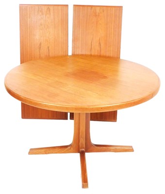 Lot 474 - A mid century teak circular dining table, with...