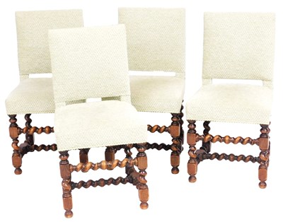 Lot 593 - A set of four Carolean style oak dining chairs,...