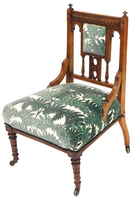 Lot 584 - A Victorian gothic revival mahogany nursing...
