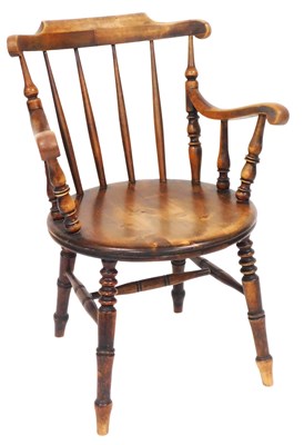 Lot 586 - A Victorian oak and beech elbow chair, with...