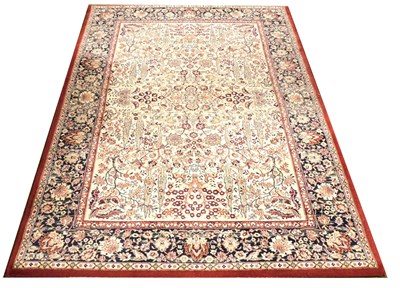 Lot 595 - A Ryalux cream Chenar wool rug, inspired by a...