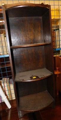 Lot 1144 - A early 20thC oak bow front freestanding...