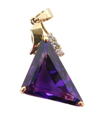 Lot 1080 - A 20thC amethyst and diamond abstract pendant,...
