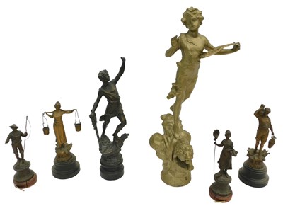 Lot 1203 - A later painted gilt spelter figure of a child...