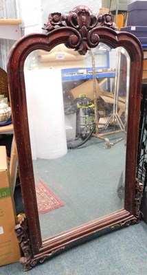 Lot 2587 - A mahogany wall mirror, the moulded arch frame...