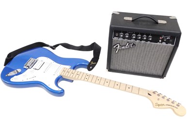 Lot 1204 - A Squier by Fender Stratocaster guitar, in...