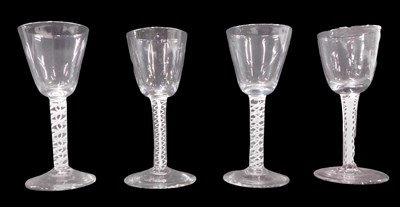 Lot 1210 - Four late 18thC small goblet glasses, with...