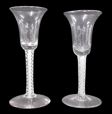 Lot 1212 - Two 18thC wine glasses, with bell shaped bowls,...