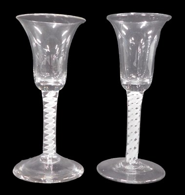 Lot 1213 - Two 18thC wine glasses, with bell shaped bowls...