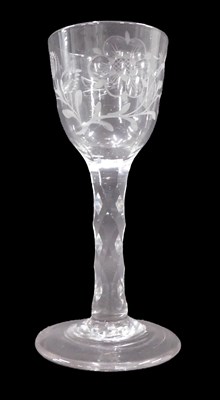 Lot 1216 - An 18thC wine glass, with round funnel bowl,...