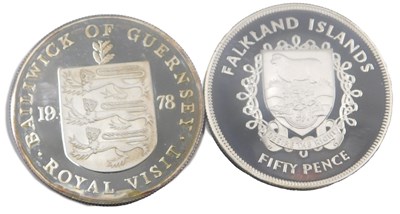 Lot 1236 - Two silver 1977 Jubilee crowns, in blue cases.