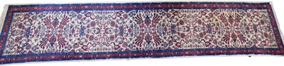 Lot 1403 - A Sarouk Persian cream ground rug, with repeat...
