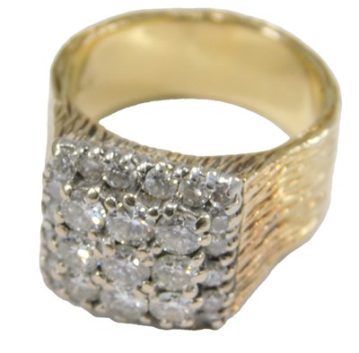 Lot 437 - An 18ct gold and diamond ring, set with twenty...