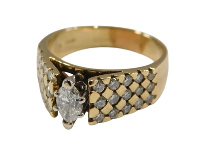 Lot 438 - A 14ct gold and diamond ring, set with a...