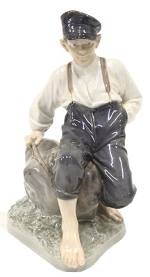 Lot 1248 - A Royal Copenhagen porcelain figure of a...