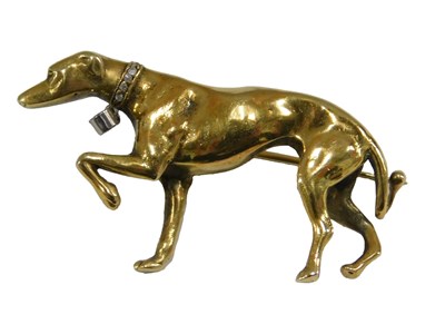 Lot 1098 - A Greyhound brooch, with a diamond set collar...