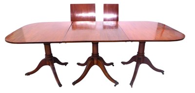 Lot 960 - A 19thC mahogany three pillar dining table,...