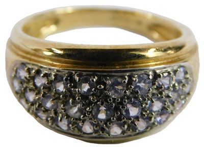 Lot 73 - A yellow gold and amethyst dress ring, marked...