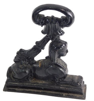 Lot 291 - A 19thC black painted cast iron doorstop,...