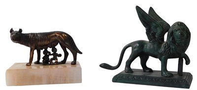 Lot 298 - A 20thC bronze depicting a winged lion, on a...
