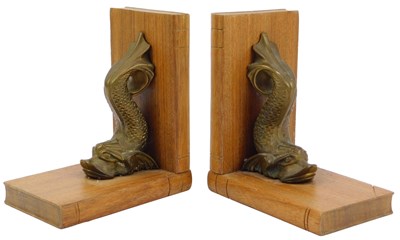 Lot 109 - A pair of 20thC teak L shaped bookends,...