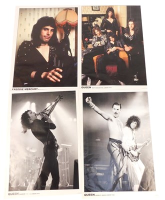 Lot 134 - Four reproduction posters relating to Queen...
