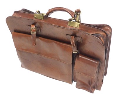 Lot 1112 - A leather briefcase, with various compartments,...