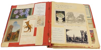 Lot 181 - A 20thC scrap album, containing greetings...
