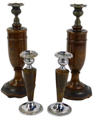 Lot 323 - A pair of 20thC turned oak candlesticks, with...