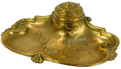 Lot 193 - A Victorian brass inkstand, of scrolling form...
