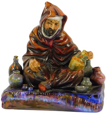 Lot 200 - A Royal Doulton porcelain figure, modelled as...
