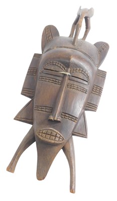 Lot 133 - A Senufo Ivory Coast tribal mask, carved as a...